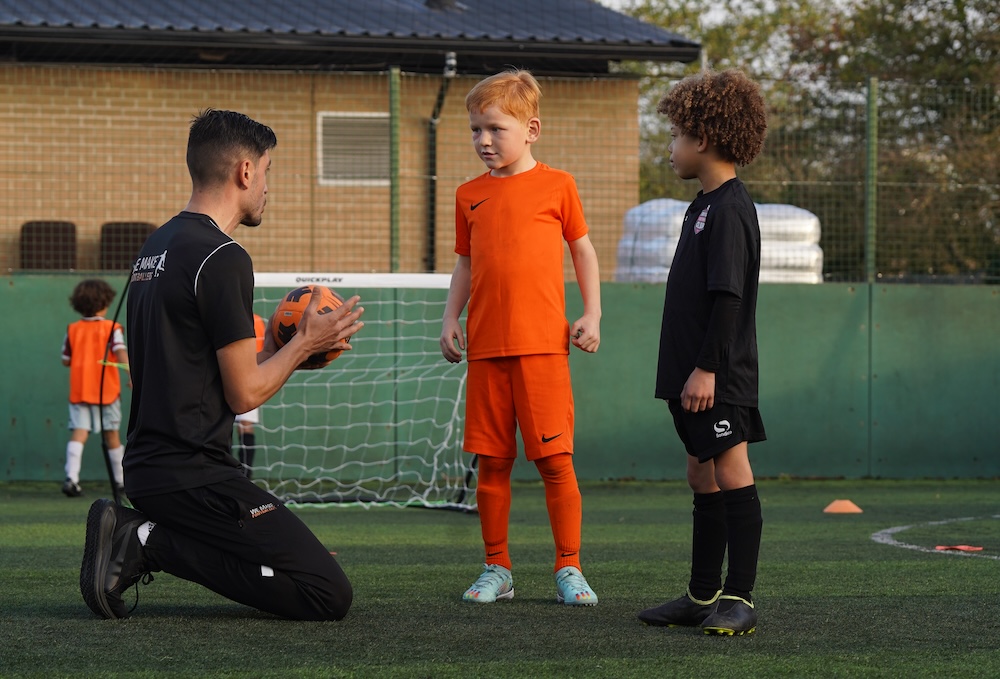 How to help your kids get better at football: tips from pro coaches